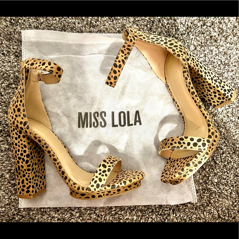 Cheetah high heels size 7 about 4 inch heel, never worn